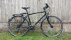 Schwarzes Trekking Bike, Diamant* Rahmen, 21-27 Gang Schaltung, Rizer*- Lenker, Gelsattel, 37-47-er Reifenbreite, Rahmenhöhen 52